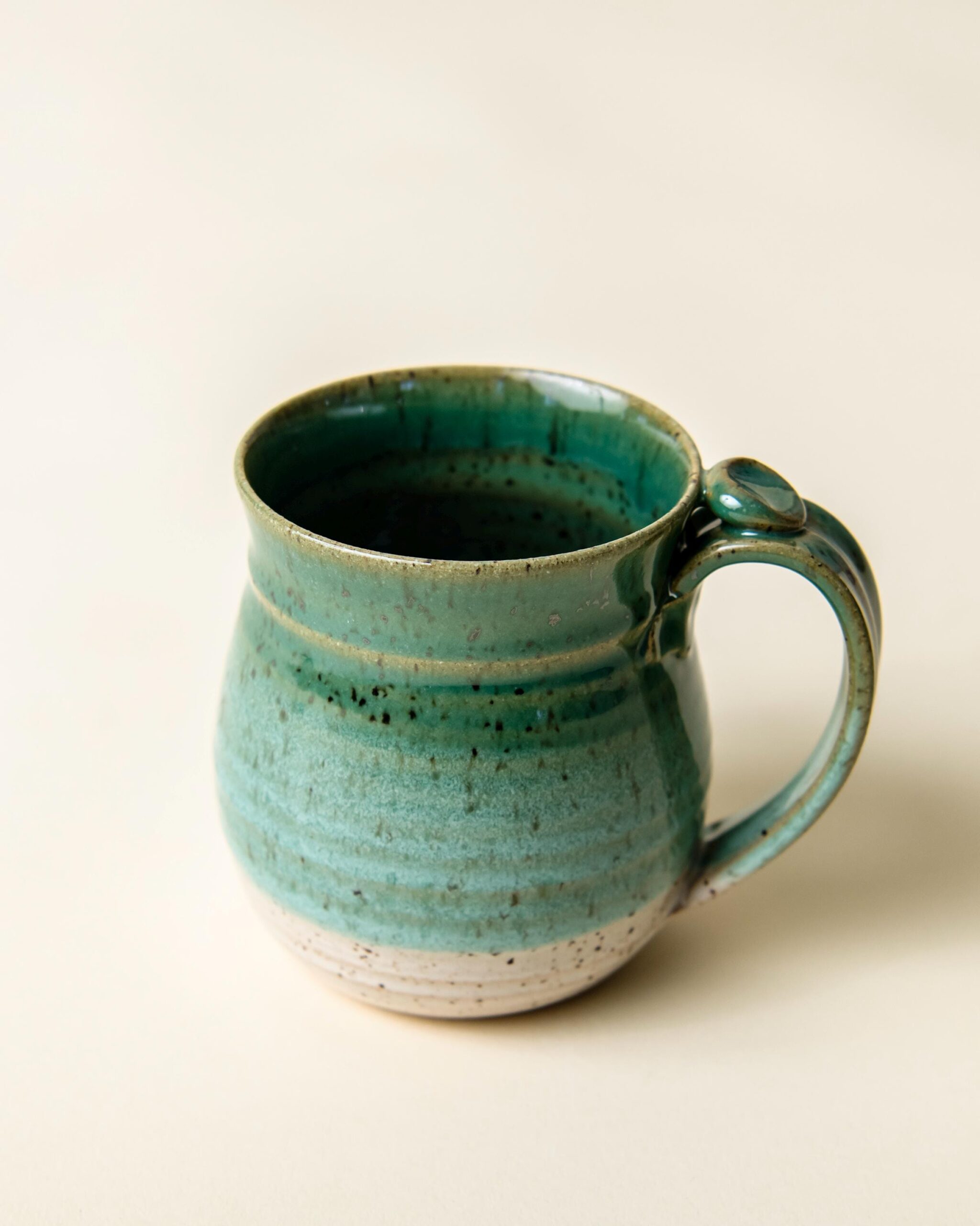 Handmade Ceramic Coffee Mug cup thumb rest green and white pottery clay cup stonehouse pottery